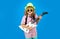 Musik education. Portrait of cute child boy at guitar practice. Funny rock child with guitar.