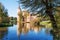 Muskau Palace reflected in the lake in the Lusatia