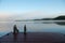 Muskoka dock on a misty morning lake