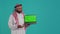 Muslim adult shows greenscreen laptop