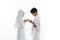 Muslim asian children shake hands