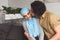 muslim boyfriend kissing girlfriend in hijab