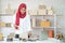 Muslim business woman working in office, Modern Muslim Business Woman, Small business, Online trading and shipping services.