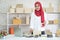 Muslim business woman working in office, Modern Muslim Business Woman, Small business, Online trading and shipping services.