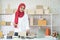 Muslim business woman working in office, Modern Muslim Business Woman, Small business, Online trading and shipping services.