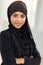 Muslim businesswoman arms crossed