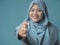 Muslim Businesswoman Offering Hand Shake