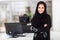 Muslim businesswoman office