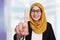 Muslim Businesswoman Showing Number One Gesture