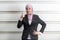 Muslim Businesswoman stands in front of a white wall