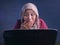 Muslim Businesswoman Working on Laptop Shocked Stunned gesture