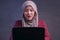 Muslim Businesswoman Working on Laptop Shocked Stunned gesture