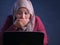 Muslim Businesswoman Working on Laptop Shocked Stunned gesture