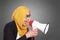 Muslim Businesswoman Yelling Motivating with Megaphone