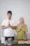 Muslim couple greeting on hari raya