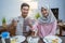 muslim couple having breakfast or sahur early morning