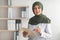 Muslim Doctor Lady Standing In Clinic Office, Wearing Hijab