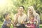 Muslim family playing with soap bubble