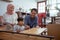 muslim family and son assembling new furniture