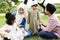 Muslim family spending time at a park