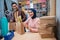 Muslim female and male preparing delivery parcel at the shop