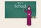 Muslim female teacher and Back to school text on chalkboard