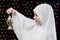 Muslim Girl in White Hejab Holding Lantern