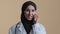 Muslim islamic doctor young intern arab woman surgeon intern in hijab wear medical coat talk by cellphone with patient