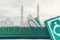 Muslim islamic faith concept Koran book, green rosary, green mat pray. Symbols of the Muslim faith on the background of a white