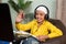 Muslim kid busy on online class by making video call on laptop - concept of new normal, e-learning, virtual education and home