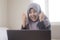 Muslim Lady Shows Winning Gesture, Receiving Good News on Her Email