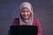 Muslim Lady Shows Winning Gesture, Receiving Good News on Her Email