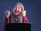 Muslim Lady Shows Winning Gesture, Receiving Good News on Her Email