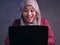 Muslim Lady Shows Winning Gesture, Receiving Good News on Her Email