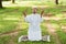 Muslim man praying outdoor. Nature landscape.Muslim man praying on green meadow.Muslim prayer,the light of faith, hope, faith.