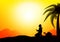 Muslim man praying during sunset background,