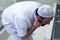 Muslim man taking ablution for prayer. Islamic Religious Rite Ceremony Of Ablution. Young Muslim man perform ablution wudhu