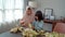 muslim mother and daughter make ketupat for eid mubarak