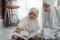 Muslim parent and daughter reading quran