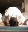 Muslim, prayer and mosque with a man praying in faith or faith for fajr, dhuhr or asr, otherwise maghrib or ishaa in a