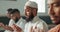 Muslim, praying and group in a Mosque for spiritual religion together as men to worship Allah in Ramadan. Islamic