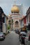 Muslim Quarter in Singapore on a partly cloudy day showing off the streets and mosque attraction for the Muslim population an