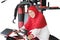 Muslim senior woman riding exercise bike