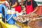 Muslim shoppers buying food from street vendor for breaking fast