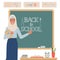 Muslim teacher stands near the school blackboard.