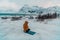 A Muslim traveling through arctic cold regions while performing the Muslim prayer namaz during breaks