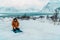 A Muslim traveling through arctic cold regions while performing the Muslim prayer namaz during breaks