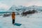 A Muslim traveling through arctic cold regions while performing the Muslim prayer namaz during breaks