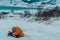 A Muslim traveling through arctic cold regions while performing the Muslim prayer namaz during breaks