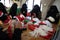 Muslim veiled women make Christmas games in Gaza Strip